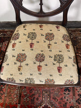 Load image into Gallery viewer, An Edwardian Sheraton Style Wheel Back Open Armchair With Amazing Carved Detail