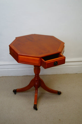 An octagonal drum table made from golden Yew made by A1 furniture Enfield