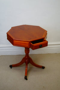 An octagonal drum table made from golden Yew made by A1 furniture Enfield