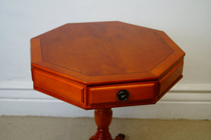 An octagonal drum table made from golden Yew made by A1 furniture Enfield