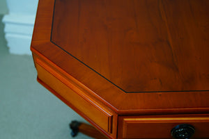 An octagonal drum table made from golden Yew made by A1 furniture Enfield