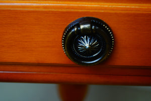 An octagonal drum table made from golden Yew made by A1 furniture Enfield