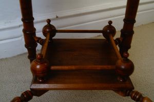 A lovely antique antique Edwardian octagonal shaped occasional table with a lowered shelf