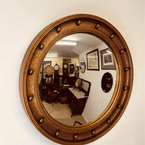 A Regency style gilt framed circular convex butlers mirror in fantastic condition