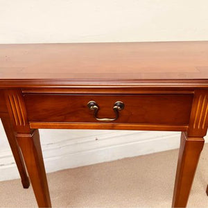 A golden Teak console table made by Strongbow in fantastic condition