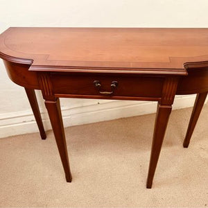 A golden Teak console table made by Strongbow in fantastic condition