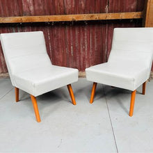 Load image into Gallery viewer, A gorgeous pair of mid century Laidback armchairs