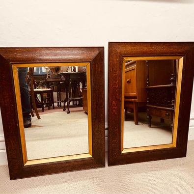 A pair of matching 19th century French oak mirrors with moulded frames