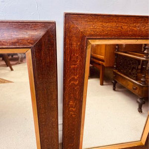 A pair of matching 19th century French oak mirrors with moulded frames