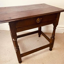 Load image into Gallery viewer, A period oak side table dating from the early 18th century, with a pegged two plank top