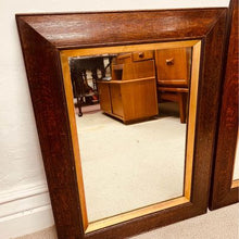 Load image into Gallery viewer, A pair of matching 19th century French oak mirrors with moulded frames