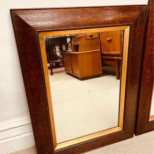 A pair of matching 19th century French oak mirrors with moulded frames