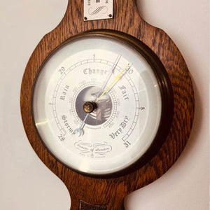 A lovely of London wooden oak banjo barometer with thermometer