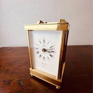 A heavy solid brass melody chime mantle clock