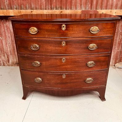 A fantastic late George III mahogany bow fronted chest of drawers with amazing colour