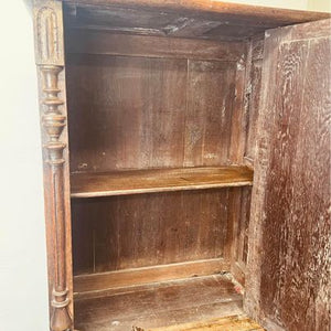 A fantastic solid oak cabinet with twelve individual double bevelled glass panel