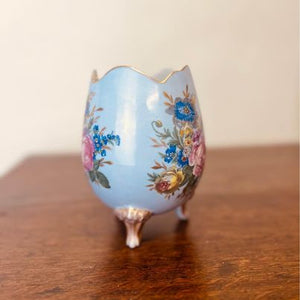 A beautiful Limoges French egg vase, having stunning roses highlighted with gilt on three sides