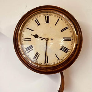 An immaculate large mahogany cased twin Fusee Striking wall clock housed in a mahogany case