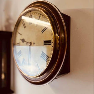 An immaculate large mahogany cased twin Fusee Striking wall clock housed in a mahogany case