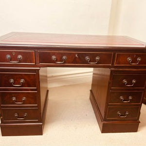 An extremely handsome Colonial twin pedestal writing desk in lovely original condition