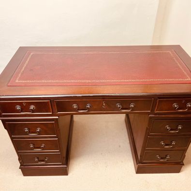 An extremely handsome Colonial twin pedestal writing desk in lovely original condition