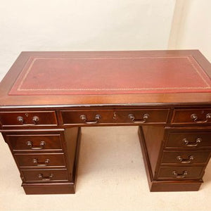 An extremely handsome Colonial twin pedestal writing desk in lovely original condition