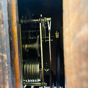 An immaculate large mahogany cased twin Fusee Striking wall clock housed in a mahogany case