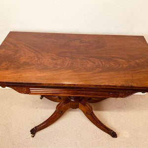 A handsome Regency rosewood fold over card table with lovely rich woodgrain