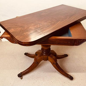 A handsome Regency rosewood fold over card table with lovely rich woodgrain