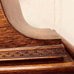 An ornate mahogany wooden Napoleon Hat mantle clock with Westminster chime