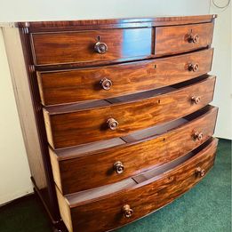 A large and impressive Victorian mahogany bow fronted chest of drawers with fantastic colour