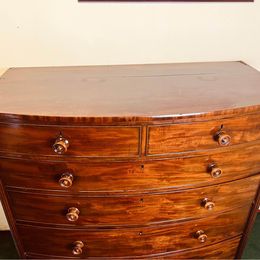 A large and impressive Victorian mahogany bow fronted chest of drawers with fantastic colour