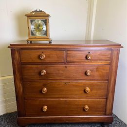 A fabulous mahogany chest of drawers with mother of pearl inlaid drawer knobs