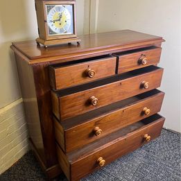 A fabulous mahogany chest of drawers with mother of pearl inlaid drawer knobs