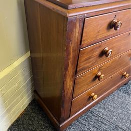 A fabulous mahogany chest of drawers with mother of pearl inlaid drawer knobs