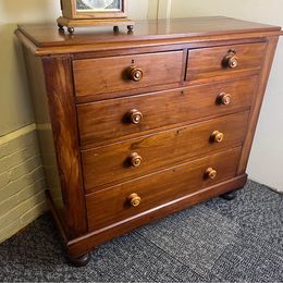 A fabulous mahogany chest of drawers with mother of pearl inlaid drawer knobs