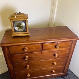 A fabulous mahogany chest of drawers with mother of pearl inlaid drawer knobs