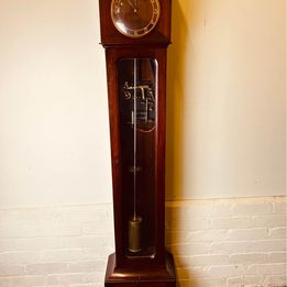 A rare mahogany cased Art Deco factory electric clock circa 1930 in lovely condition