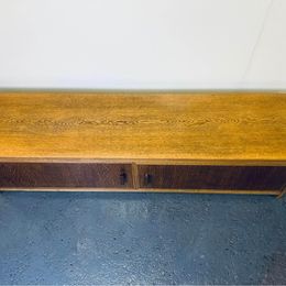 A fabulous Mid-Century low console cabinet hand made from solid oak