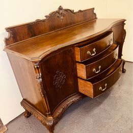 A fantastic quality Chippendale revival mahogany bow fronted sideboard