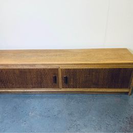 A fabulous Mid-Century low console cabinet hand made from solid oak