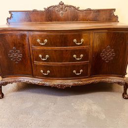 A fantastic quality Chippendale revival mahogany bow fronted sideboard