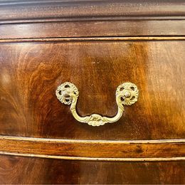 A fantastic quality Chippendale revival mahogany bow fronted sideboard