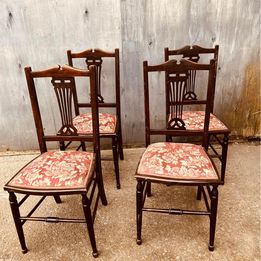 A matching set of four late nineteenth century Edwardian mahogany side chairs