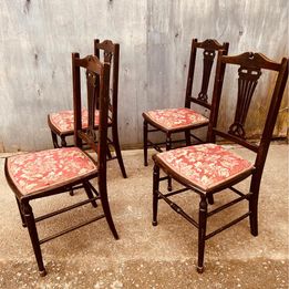 A matching set of four late nineteenth century Edwardian mahogany side chairs