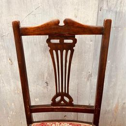 A matching set of four late nineteenth century Edwardian mahogany side chairs