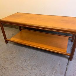 A lovely Nathan Mid-Century Teak coffee table with amazing shoulders