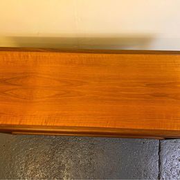 A lovely Nathan Mid-Century Teak coffee table with amazing shoulders