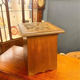 A lovely Edwardian mahogany fireside log or coal cabinet seat beautifully carved