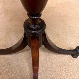 Antique oval mahogany wine table ,the carved piecrust top above a revolving turned stem